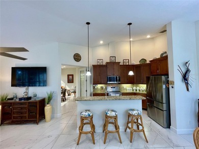 Stunning end unit, 3/2/2, 2013 built, split floor plan, 1471sf on Bobcat Trail Golf Club in Florida - for sale on GolfHomes.com, golf home, golf lot