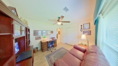 Nestled on the 3rd tee box, this beautifully designed 3-bedroom on Shalimar Pointe Golf and Country Club in Florida - for sale on GolfHomes.com, golf home, golf lot