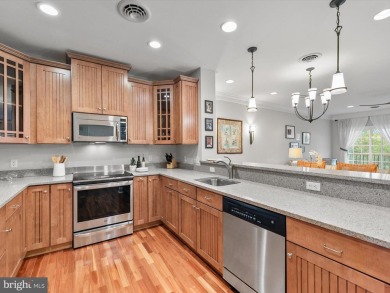 Beautiful three-bedroom, three full bath condominium showcasing on The Peninsula Golf and Country Club in Delaware - for sale on GolfHomes.com, golf home, golf lot