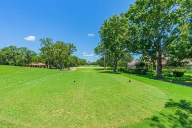 Nestled on the 3rd tee box, this beautifully designed 3-bedroom on Shalimar Pointe Golf and Country Club in Florida - for sale on GolfHomes.com, golf home, golf lot