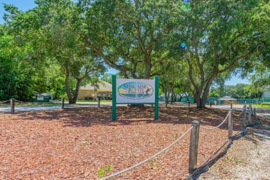 Nestled on the 3rd tee box, this beautifully designed 3-bedroom on Shalimar Pointe Golf and Country Club in Florida - for sale on GolfHomes.com, golf home, golf lot