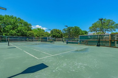 Nestled on the 3rd tee box, this beautifully designed 3-bedroom on Shalimar Pointe Golf and Country Club in Florida - for sale on GolfHomes.com, golf home, golf lot