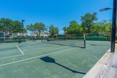 Nestled on the 3rd tee box, this beautifully designed 3-bedroom on Shalimar Pointe Golf and Country Club in Florida - for sale on GolfHomes.com, golf home, golf lot
