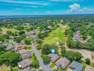 Nestled on the 3rd tee box, this beautifully designed 3-bedroom on Shalimar Pointe Golf and Country Club in Florida - for sale on GolfHomes.com, golf home, golf lot