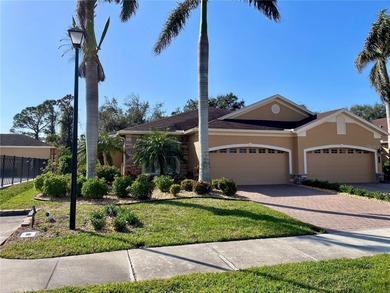 Stunning end unit, 3/2/2, 2013 built, split floor plan, 1471sf on Bobcat Trail Golf Club in Florida - for sale on GolfHomes.com, golf home, golf lot