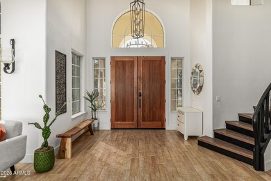 Beautifully remodeled home offering spectacular mountain views on The Foothills Golf Club in Arizona - for sale on GolfHomes.com, golf home, golf lot