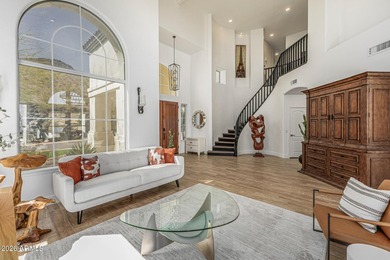 Beautifully remodeled home offering spectacular mountain views on The Foothills Golf Club in Arizona - for sale on GolfHomes.com, golf home, golf lot