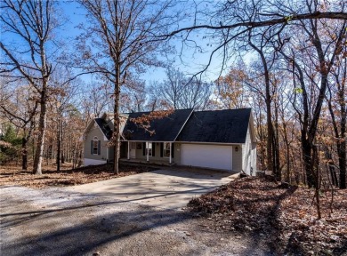 Beautiful home located on a quiet cul-de-sac surrounded by woods on Holiday Island Executive Golf Course in Arkansas - for sale on GolfHomes.com, golf home, golf lot