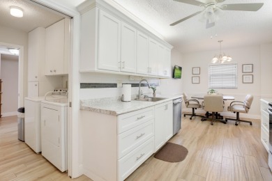 WELCOME TO THIS SPACIOUS, ATTRACTIVE CORNER, TOP FLOOR  CONDO on Poinciana Golf Club in Florida - for sale on GolfHomes.com, golf home, golf lot