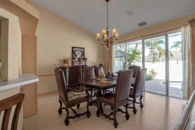 Welcome to Palm Court, a sought-after Mediterranean-style on IMG Academies Golf and Country Club in Florida - for sale on GolfHomes.com, golf home, golf lot