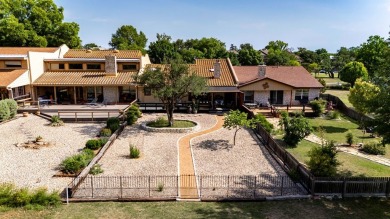 Delightful one-story townhome overlooking the #5 fairway on on Riverhill Country Club in Texas - for sale on GolfHomes.com, golf home, golf lot