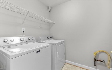 This townhome-style residence in The Soundings on the Nansemond on Riverfront Golf Club in Virginia - for sale on GolfHomes.com, golf home, golf lot