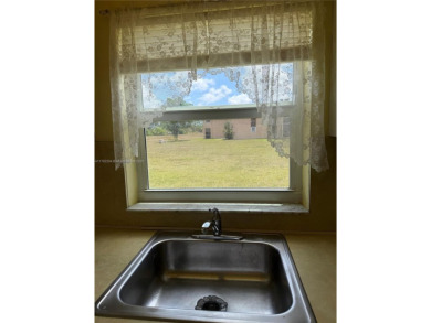 Fabulous 1st floor unit, corner unit, bright and beautiful.  55 on Sunrise Lakes Phase III in Florida - for sale on GolfHomes.com, golf home, golf lot