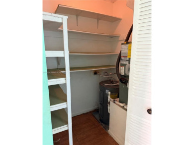 Fabulous 1st floor unit, corner unit, bright and beautiful.  55 on Sunrise Lakes Phase III in Florida - for sale on GolfHomes.com, golf home, golf lot