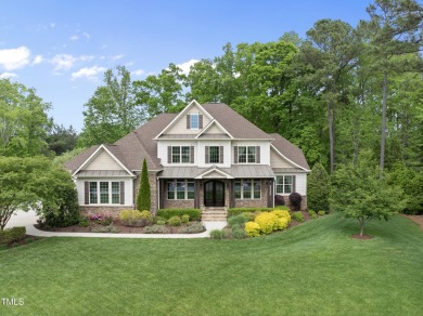 Located in the highly sought-after Hasentree community, this on Hasentree Club in North Carolina - for sale on GolfHomes.com, golf home, golf lot