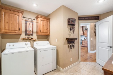 Welcome to 4310 Buttonwood Drive--a stunning all-brick and stone on Fremont Hills Country Club in Missouri - for sale on GolfHomes.com, golf home, golf lot