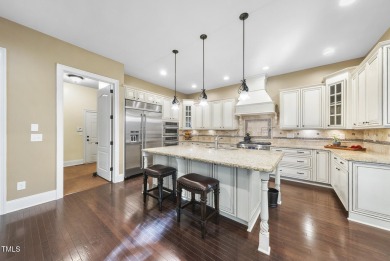 Located in the highly sought-after Hasentree community, this on Hasentree Club in North Carolina - for sale on GolfHomes.com, golf home, golf lot