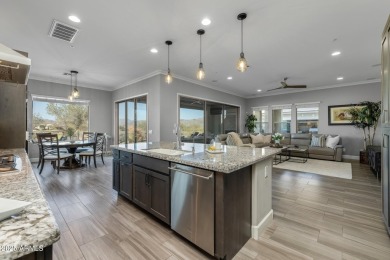 Experience luxury living at its finest in Trilogy at Verde on Vista Verde Golf Course in Arizona - for sale on GolfHomes.com, golf home, golf lot