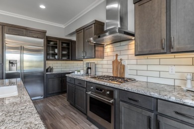 Experience luxury living at its finest in Trilogy at Verde on Vista Verde Golf Course in Arizona - for sale on GolfHomes.com, golf home, golf lot