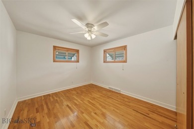 Just steps away from a large community park featuring a tennis on Headwaters Golf Course in Montana - for sale on GolfHomes.com, golf home, golf lot