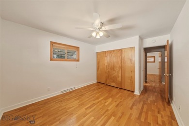 Just steps away from a large community park featuring a tennis on Headwaters Golf Course in Montana - for sale on GolfHomes.com, golf home, golf lot