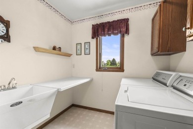 This stunning 4-bedroom, 2-story home is perfectly located just on High Cliff Golf Course in Wisconsin - for sale on GolfHomes.com, golf home, golf lot