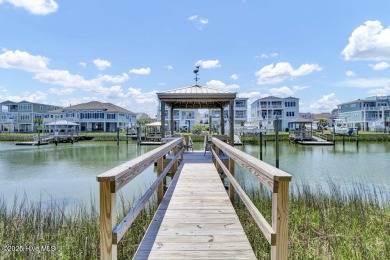 Welcome to 1512 Riverside Drive, a stunning 2,198 sq ft, 3 on Oyster Bay Golf Links in North Carolina - for sale on GolfHomes.com, golf home, golf lot