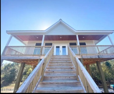 PRICE REDUCED! Just 100 yards from the picturesque Jourdan River on The Bridges Golf Club At Hollywood Casino in Mississippi - for sale on GolfHomes.com, golf home, golf lot