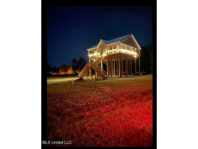 PRICE REDUCED! Just 100 yards from the picturesque Jourdan River on The Bridges Golf Club At Hollywood Casino in Mississippi - for sale on GolfHomes.com, golf home, golf lot