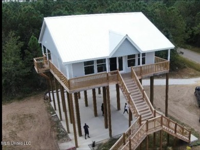 PRICE REDUCED! Just 100 yards from the picturesque Jourdan River on The Bridges Golf Club At Hollywood Casino in Mississippi - for sale on GolfHomes.com, golf home, golf lot