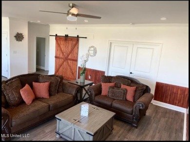 PRICE REDUCED! Just 100 yards from the picturesque Jourdan River on The Bridges Golf Club At Hollywood Casino in Mississippi - for sale on GolfHomes.com, golf home, golf lot