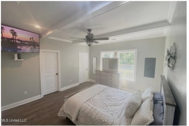 PRICE REDUCED! Just 100 yards from the picturesque Jourdan River on The Bridges Golf Club At Hollywood Casino in Mississippi - for sale on GolfHomes.com, golf home, golf lot