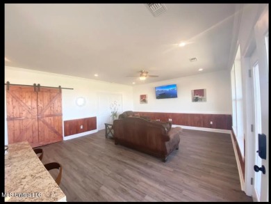 PRICE REDUCED! Just 100 yards from the picturesque Jourdan River on The Bridges Golf Club At Hollywood Casino in Mississippi - for sale on GolfHomes.com, golf home, golf lot