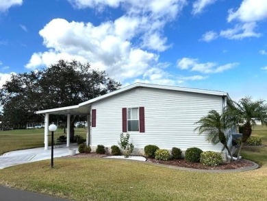 Step into comfort and style with this 2-bedroom, 2-bathroom home on Crystal Lake Club in Florida - for sale on GolfHomes.com, golf home, golf lot