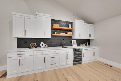 Welcome to 4 Village Court, a sprawling fully renovated ranch w/ on Columbine Country Club in Colorado - for sale on GolfHomes.com, golf home, golf lot