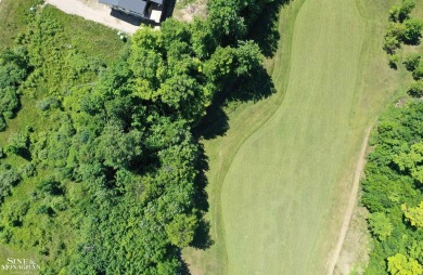 Are you looking to build your dream home with views of Grand on Lochen Heath Golf Course in Michigan - for sale on GolfHomes.com, golf home, golf lot