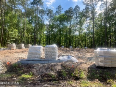 This home is to be built. 

Gorgeous one-story Ranch on on Harbour Point Golf Club in North Carolina - for sale on GolfHomes.com, golf home, golf lot
