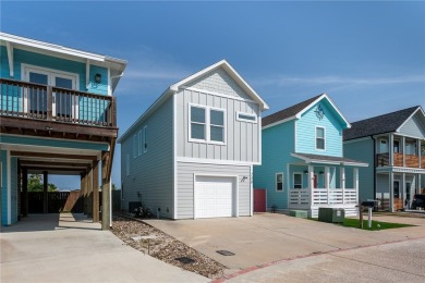 Charming coastal cottage in the desirable Nautilus Subdivision on Palmilla Beach Golf Club in Texas - for sale on GolfHomes.com, golf home, golf lot