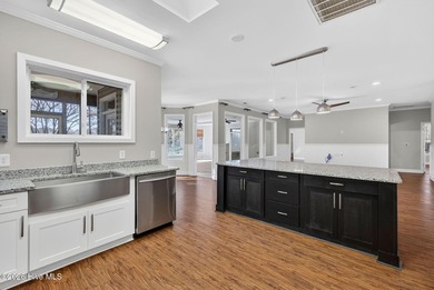 Welcome to this spacious 3-bedroom, 2-bath single-family home on The Lakes Country Club in North Carolina - for sale on GolfHomes.com, golf home, golf lot