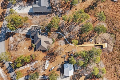 Welcome to this spacious 3-bedroom, 2-bath single-family home on The Lakes Country Club in North Carolina - for sale on GolfHomes.com, golf home, golf lot