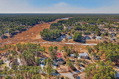 Welcome to this spacious 3-bedroom, 2-bath single-family home on The Lakes Country Club in North Carolina - for sale on GolfHomes.com, golf home, golf lot