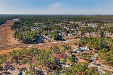 Welcome to this spacious 3-bedroom, 2-bath single-family home on The Lakes Country Club in North Carolina - for sale on GolfHomes.com, golf home, golf lot