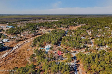 Welcome to this spacious 3-bedroom, 2-bath single-family home on The Lakes Country Club in North Carolina - for sale on GolfHomes.com, golf home, golf lot
