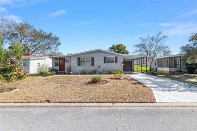 Welcome to this COMPLETELY UPDATED home in Orange Blossom, The on Orange Blossom Hills Golf and Country Club in Florida - for sale on GolfHomes.com, golf home, golf lot