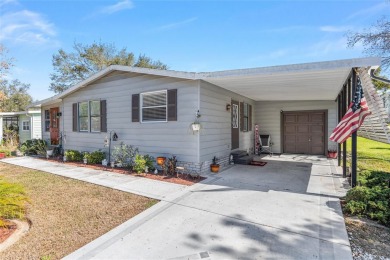 Welcome to this COMPLETELY UPDATED home in Orange Blossom, The on Orange Blossom Hills Golf and Country Club in Florida - for sale on GolfHomes.com, golf home, golf lot