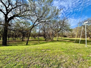 Big 4 acre undeveloped property nestled around beautiful pecan on Nocona Hills Golf Course in Texas - for sale on GolfHomes.com, golf home, golf lot