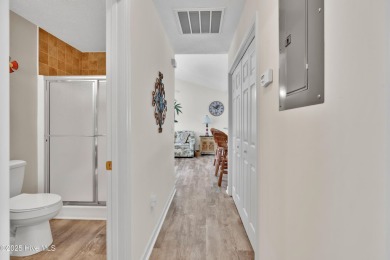 Imagine stepping into a charming getaway on Oak Island, NC on Founders Club At St. James Plantation in North Carolina - for sale on GolfHomes.com, golf home, golf lot