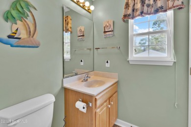 Imagine stepping into a charming getaway on Oak Island, NC on Founders Club At St. James Plantation in North Carolina - for sale on GolfHomes.com, golf home, golf lot