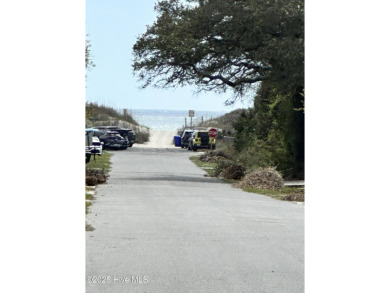 Imagine stepping into a charming getaway on Oak Island, NC on Founders Club At St. James Plantation in North Carolina - for sale on GolfHomes.com, golf home, golf lot