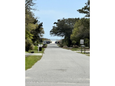 Imagine stepping into a charming getaway on Oak Island, NC on Founders Club At St. James Plantation in North Carolina - for sale on GolfHomes.com, golf home, golf lot
